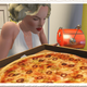 Illustration for article titled Marilyn Monroe Eats Pizza, Sleeps Alone in The Sims
